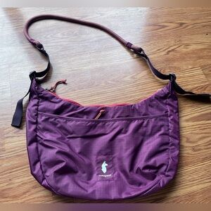 Cotopaxi crossbody bag. Brand new without tags. Beautiful plum color.